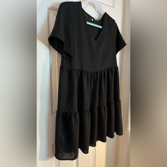 Black dress. Unknown brand. New. 100% Dacron material. Size medium. - Picture 1 of 3